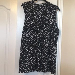 Sleeveless black and white polka dot blouse w/ tie